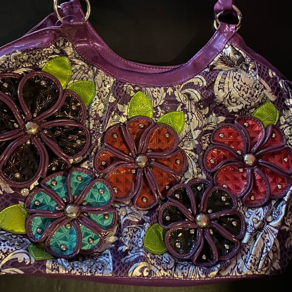 Gorgeous purple purse with with flower embellishments. - Picture 2 of 6